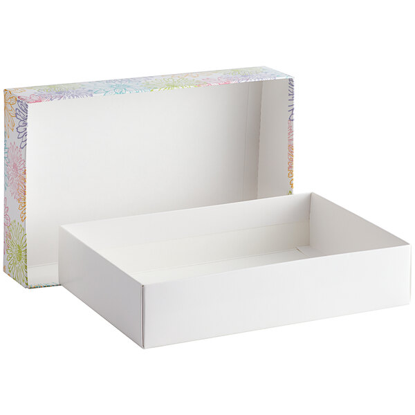 A white 2-piece candy box with a colorful spring print design on the lid.