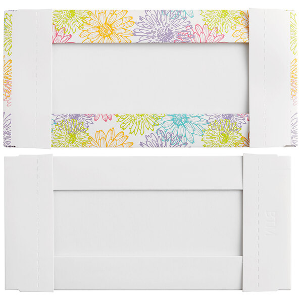 A white rectangular candy box with colorful spring print flowers on it.