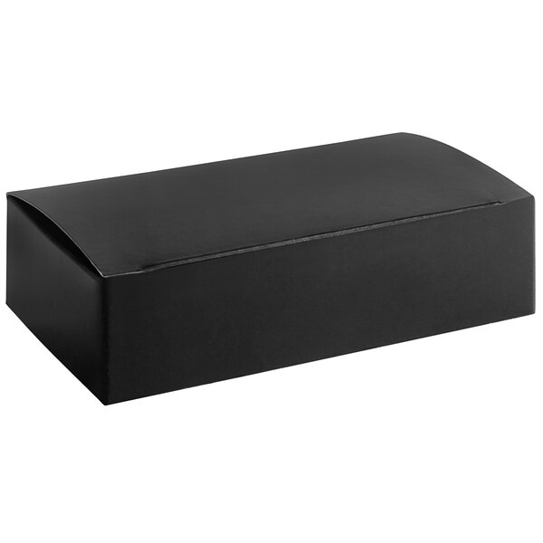 A black rectangular candy box with a lid on a white background.