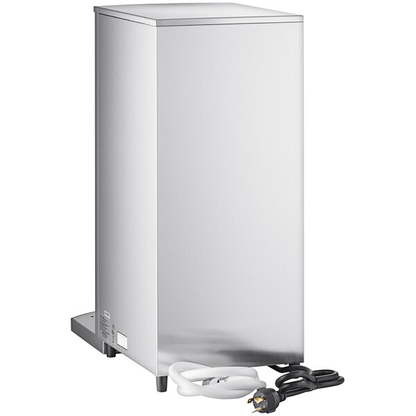 A white Grindmaster tap-operated hot water dispenser with wires.