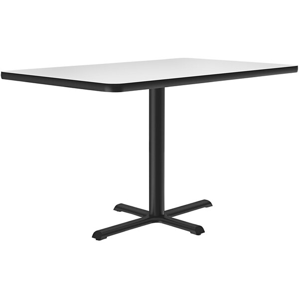 A white rectangular Correll table with a black base.