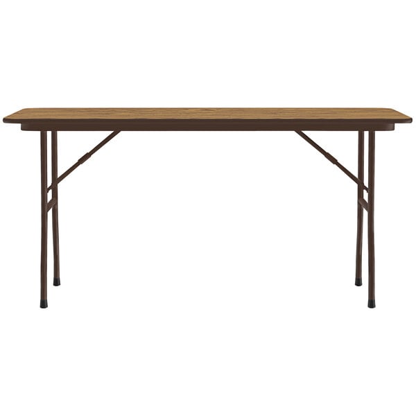 A brown rectangular Correll folding table with a medium oak top and legs.