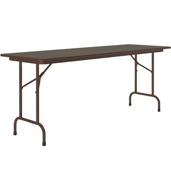 A brown rectangular Correll folding table with a metal frame.