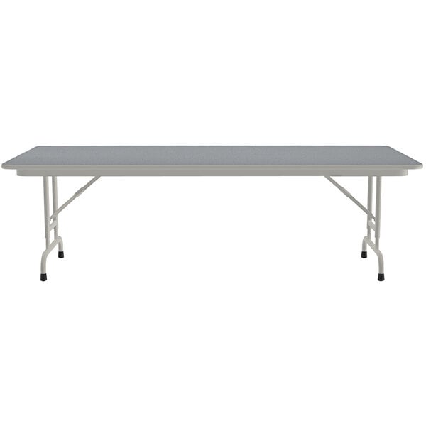 A Correll gray granite folding table with adjustable legs.