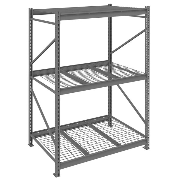 A dark grey Tennsco metal bulk storage rack unit with wire decking.