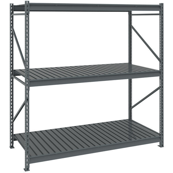 A Tennsco dark gray metal boltless shelving unit with corrugated decking.