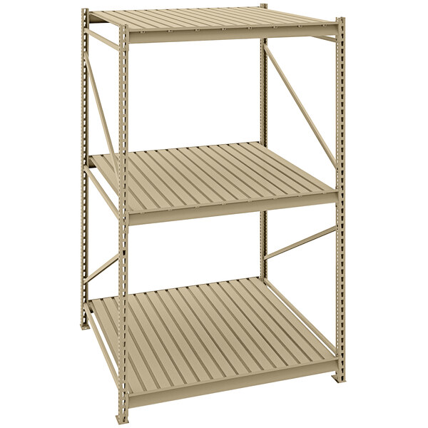 A beige Tennsco boltless shelving unit with corrugated metal decking.