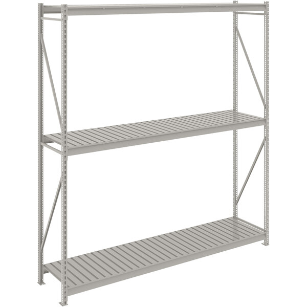 A grey metal Tennsco Bulk Storage Rack Unit with corrugated metal shelves.