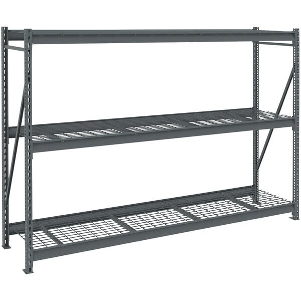 A dark grey Tennsco bulk storage rack unit with wire decking.