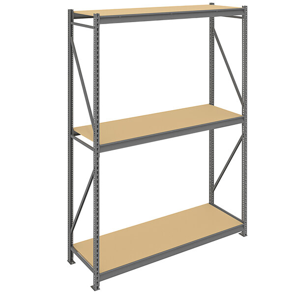 A Tennsco dark gray metal shelving unit with particleboard decking.
