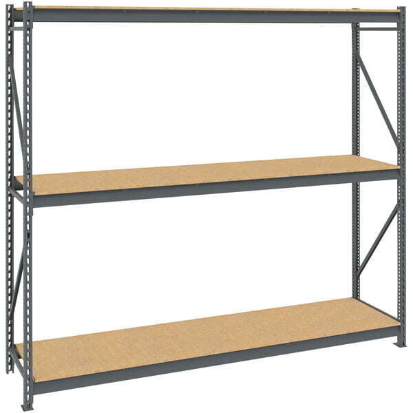 A dark gray Tennsco metal bulk storage rack with particleboard shelves.