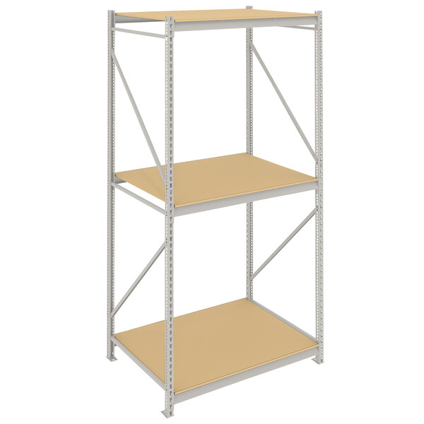 A light gray Tennsco metal bulk storage rack with particleboard shelves.