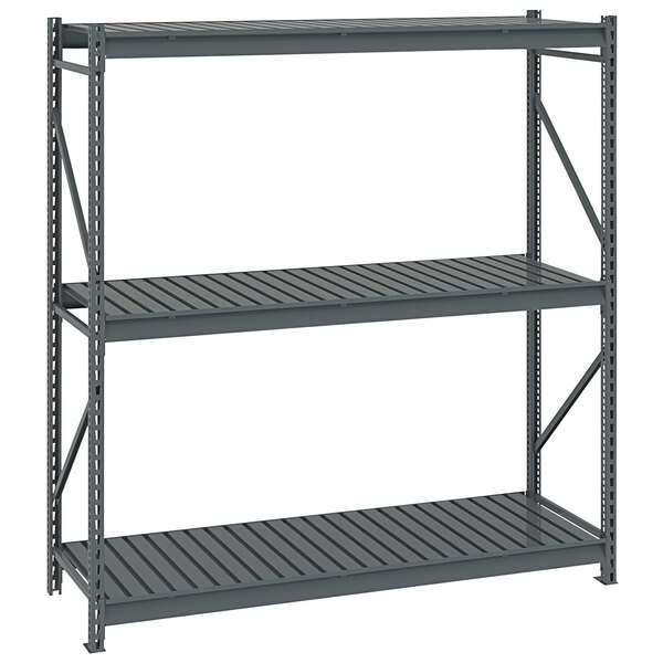 A dark gray metal Tennsco boltless shelving unit with corrugated decking.