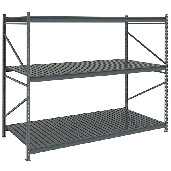 A dark gray metal Tennsco boltless shelving unit with corrugated decking.