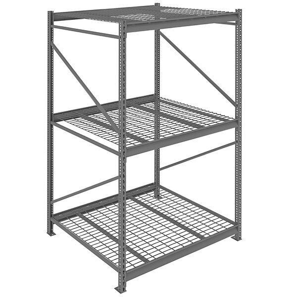 A dark grey Tennsco metal bulk storage rack unit with wire decking.