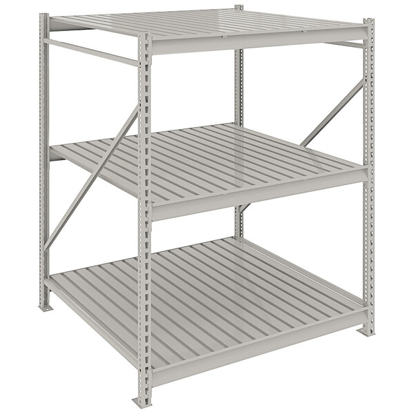 A light gray metal shelving unit with corrugated decking.