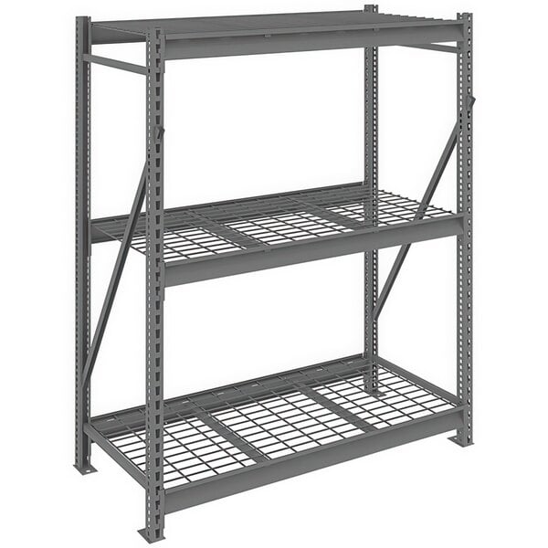 A dark gray metal Tennsco bulk storage rack with wire decking on three shelves.