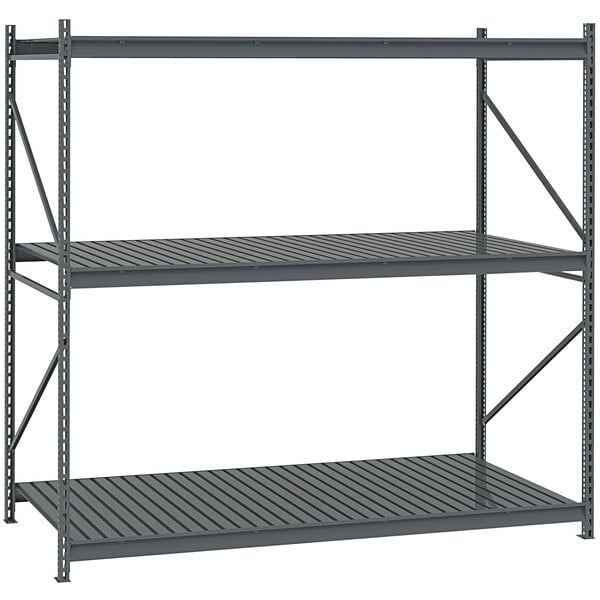 A dark grey Tennsco boltless shelving unit with corrugated decking.