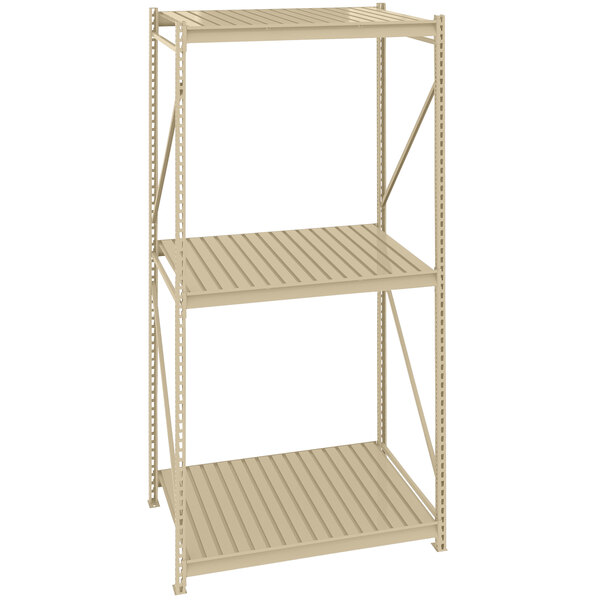 A beige Tennsco boltless shelving unit with corrugated decking.