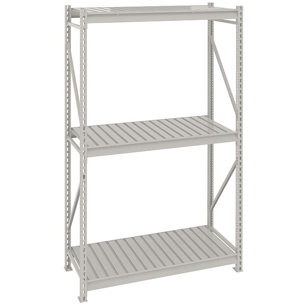 A light gray steel Tennsco bulk shelving unit with corrugated decking.