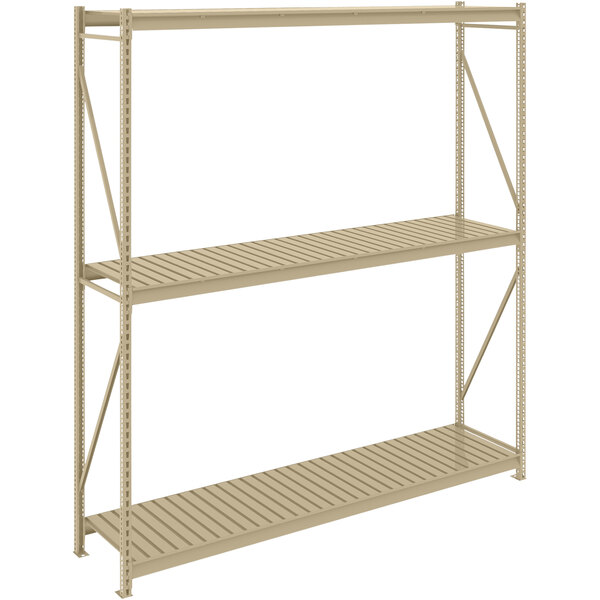 A tan steel Tennsco boltless shelving unit with corrugated decking.