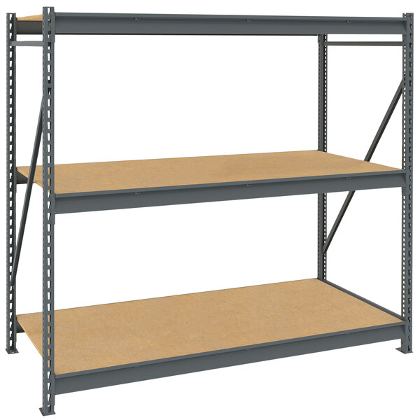 A Tennsco dark gray metal bulk storage rack unit with three shelves.
