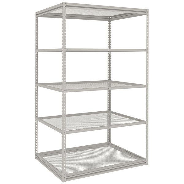 A light grey metal shelving unit with perforated steel shelves.