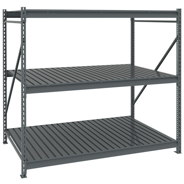 A Tennsco dark grey metal boltless shelving unit with three shelves.