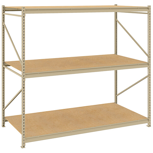 A beige metal Tennsco boltless shelving unit with three shelves.