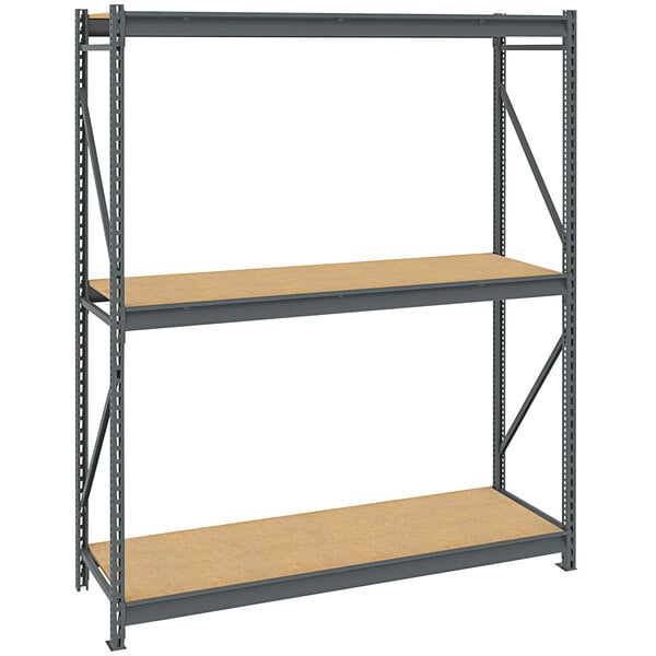 A Tennsco dark gray metal bulk storage rack shelving unit with particleboard shelves.