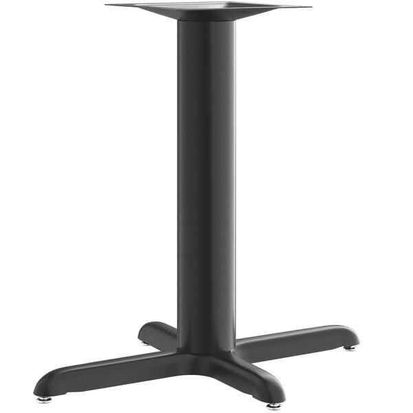 A black Lancaster Table & Seating column table base on a pedestal.