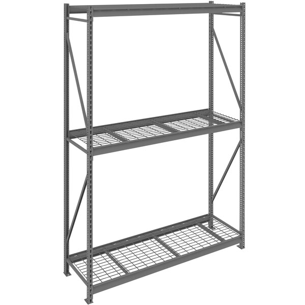 A Tennsco dark grey metal boltless shelving unit with wire decking.