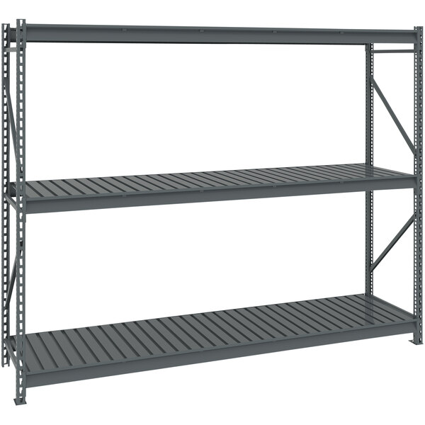 A dark grey Tennsco boltless shelving unit with three shelves.