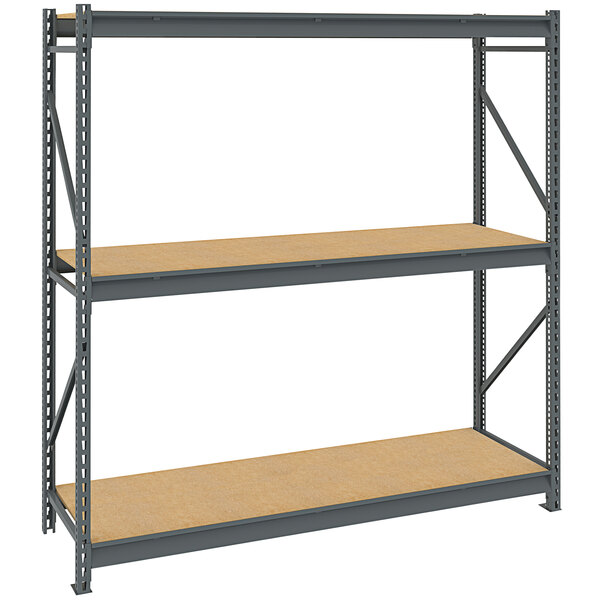 A Tennsco dark gray metal bulk storage rack unit with wood decking.