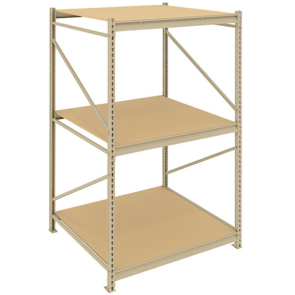 A Tennsco beige metal shelving unit with particleboard shelves.