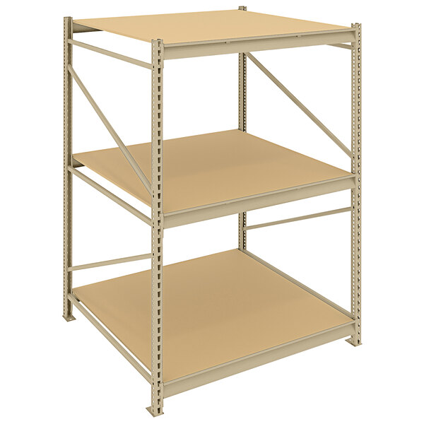 A beige metal Tennsco boltless shelving unit with particleboard decking.