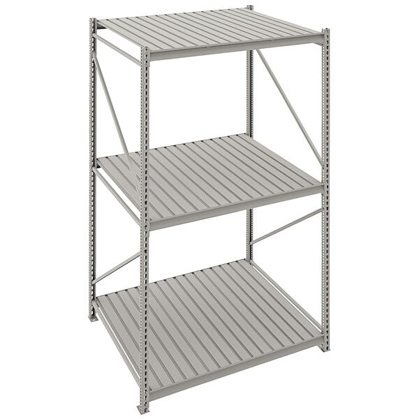 A light gray Tennsco metal bulk shelving unit with corrugated decking.