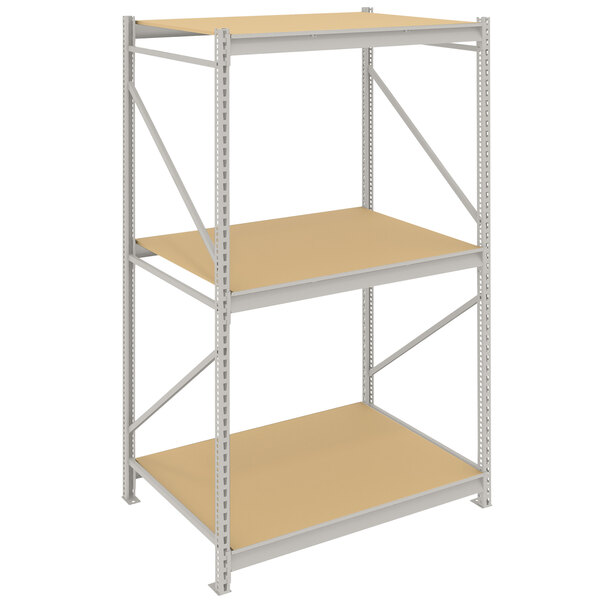 A Tennsco light gray metal bulk shelving unit with particleboard decking.