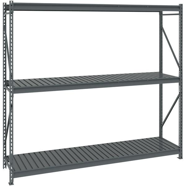 A dark grey Tennsco boltless storage rack with corrugated decking.