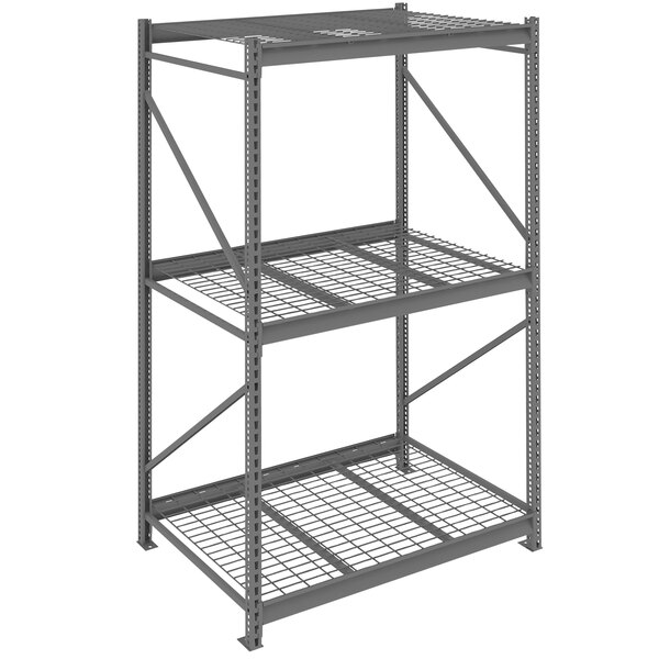 A dark grey Tennsco metal bulk storage rack unit with wire decking.