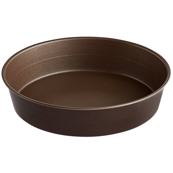 A round brown non-stick cake pan.