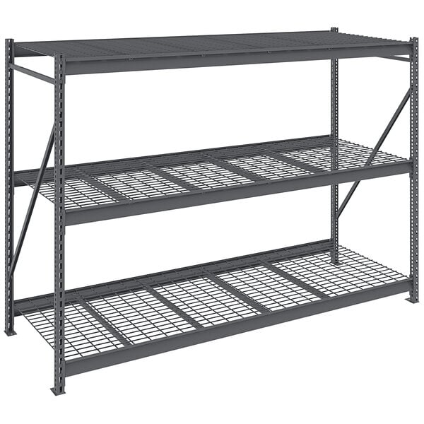 A dark grey metal Tennsco bulk storage rack unit with wire decking.