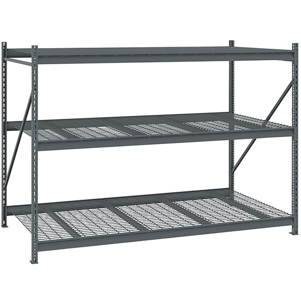 A grey metal Tennsco bulk shelving unit with wire shelves.