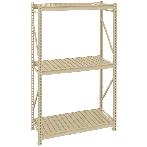 A tan Tennsco boltless shelving unit with three shelves and corrugated decking.