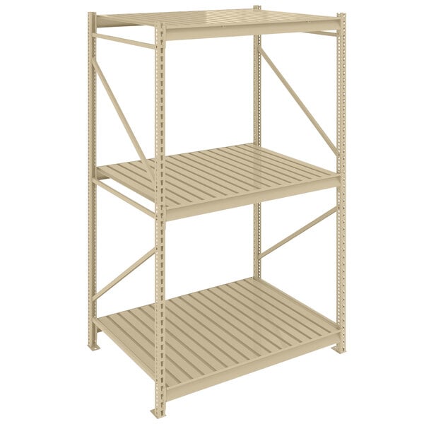 A beige Tennsco metal boltless shelving unit with corrugated decking.