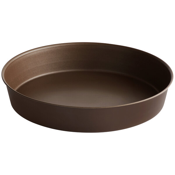 A round brown non-stick cake pan.