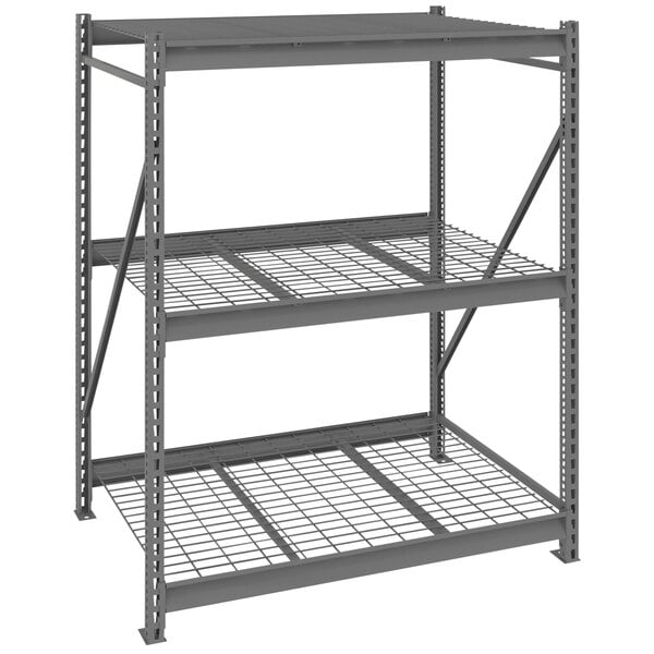 A dark grey Tennsco metal bulk storage rack shelving unit with wire decking.