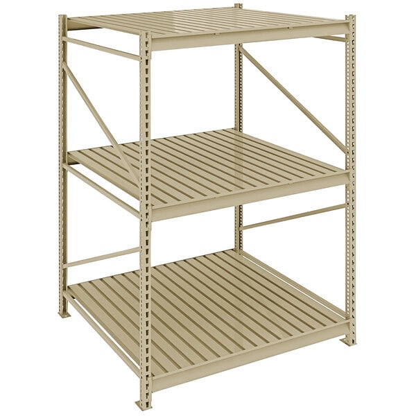 A beige metal Tennsco bulk storage shelving unit with corrugated metal shelves on each side.