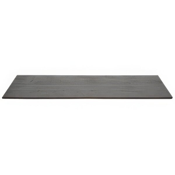 A mahogany bamboo rectangular board on a table.