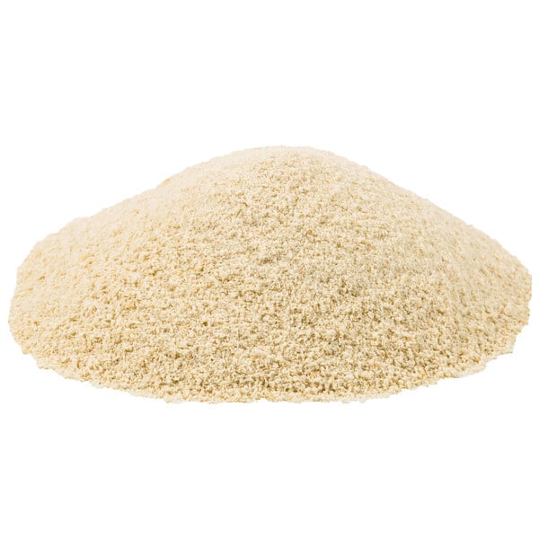 A close-up of a pile of Golden Dipt plain bread crumbs on a white background.